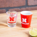 University of Nebraska 4-Piece Ceramic and Glass 2oz. Cup Set